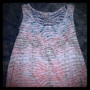 Short tunic or Sleevesless shirt